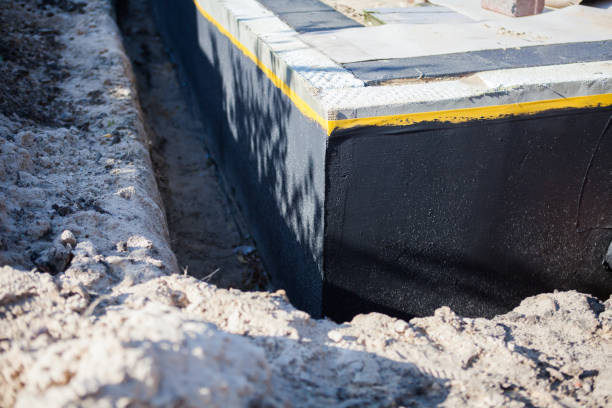 Professional Exterior Waterproofing technician working in Sardinia, NY